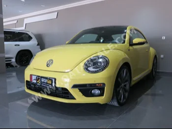 Volkswagen  Beetle  Turbo R  2016  Automatic  60,000 Km  4 Cylinder  Front Wheel Drive (FWD)  Convertible  Yellow  With Warranty