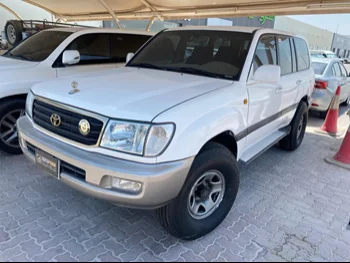Toyota  Land Cruiser  GX  2002  Automatic  480,000 Km  6 Cylinder  Four Wheel Drive (4WD)  SUV  White  With Warranty