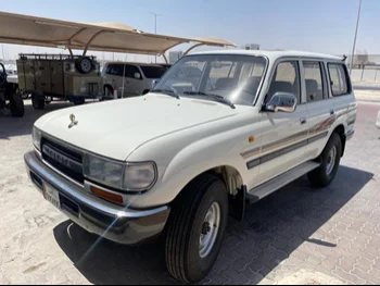 Toyota  Land Cruiser  VX  1994  Manual  300,000 Km  6 Cylinder  Four Wheel Drive (4WD)  SUV  White  With Warranty