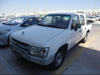 Toyota  Hilux  2003  Automatic  390,000 Km  4 Cylinder  Front Wheel Drive (FWD)  Pick Up  White  With Warranty