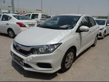 Honda  City  2020  Automatic  137,000 Km  4 Cylinder  Front Wheel Drive (FWD)  Sedan  White  With Warranty
