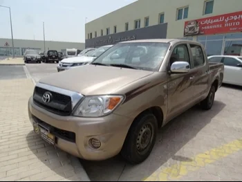 Toyota  Hilux  2009  Manual  237,000 Km  4 Cylinder  Front Wheel Drive (FWD)  Pick Up  Beige