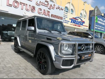 Mercedes-Benz  G-Class  63 AMG  2014  Automatic  208,000 Km  8 Cylinder  Four Wheel Drive (4WD)  SUV  Gray