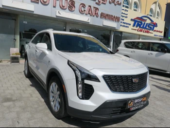 Cadillac  XT4  2020  Automatic  32,000 Km  6 Cylinder  All Wheel Drive (AWD)  SUV  White  With Warranty