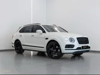  Bentley  Bentayga  2019  Automatic  19,000 Km  12 Cylinder  Four Wheel Drive (4WD)  SUV  White  With Warranty