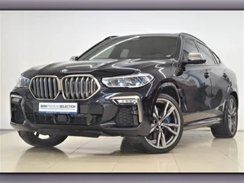 BMW  X-Series  X6 M50i  2020  Automatic  45,250 Km  8 Cylinder  Four Wheel Drive (4WD)  SUV  Black  With Warranty