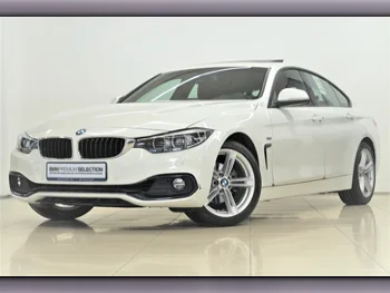 BMW  4-Series  420 I  2019  Automatic  16,200 Km  4 Cylinder  Rear Wheel Drive (RWD)  Sedan  White  With Warranty