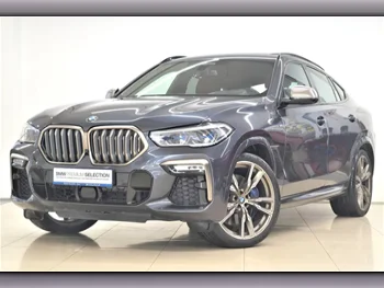 BMW  X-Series  X6 M50i  2020  Automatic  70,400 Km  8 Cylinder  Four Wheel Drive (4WD)  SUV  Gray  With Warranty