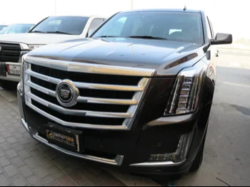 Cadillac  Escalade  2015  Automatic  149,000 Km  8 Cylinder  Four Wheel Drive (4WD)  SUV  Brown