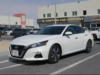 Nissan  Altima  2022  Automatic  13,000 Km  4 Cylinder  Front Wheel Drive (FWD)  Sedan  White  With Warranty