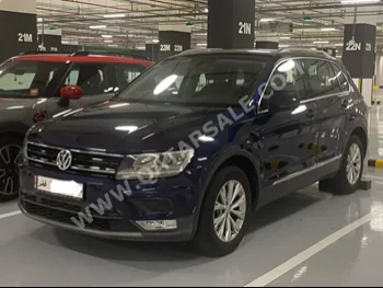 Volkswagen  Tiguan  2.0 TSI  2017  Automatic  94,000 Km  4 Cylinder  All Wheel Drive (AWD)  SUV  Blue  With Warranty