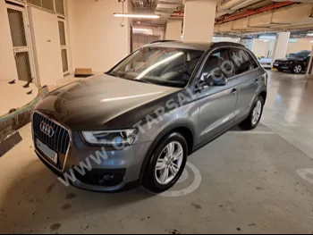 Audi  Q3  2.0 T  2013  Automatic  127,000 Km  4 Cylinder  Front Wheel Drive (FWD)  SUV  Gray