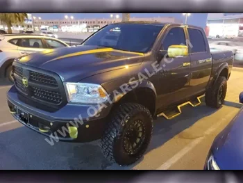  Dodge  Ram  1500  2014  Automatic  200,100 Km  8 Cylinder  Four Wheel Drive (4WD)  Pick Up  Black and Gold  With Warranty