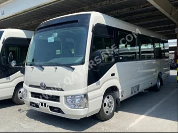 Toyota  Coaster  2023  Automatic  0 Km  4 Cylinder  Rear Wheel Drive (RWD)  Van / Bus  White  With Warranty