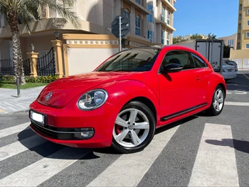 Volkswagen  Beetle  2014  Automatic  74,000 Km  4 Cylinder  Rear Wheel Drive (RWD)  Hatchback  Red