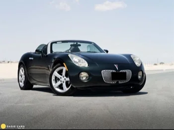 Pontiac  Solstice  2000  Automatic  124,000 Km  6 Cylinder  Rear Wheel Drive (RWD)  Convertible  Green