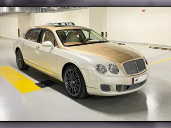 Bentley  Continental  Flying Spur  2012  Automatic  31,000 Km  12 Cylinder  All Wheel Drive (AWD)  Sedan  White and Golden  With Warranty