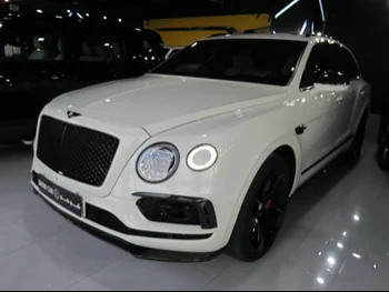 Bentley  Bentayga  2018  Automatic  31,000 Km  12 Cylinder  Four Wheel Drive (4WD)  SUV  White  With Warranty