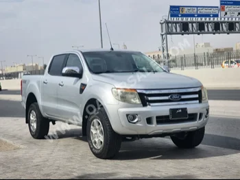  Ford  Ranger  XLT  2015  Manual  35,000 Km  4 Cylinder  Four Wheel Drive (4WD)  Pick Up  Silver  With Warranty