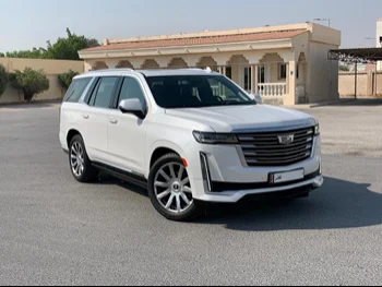  Cadillac  Escalade  Platinum  2021  Automatic  23,000 Km  8 Cylinder  Four Wheel Drive (4WD)  SUV  White  With Warranty