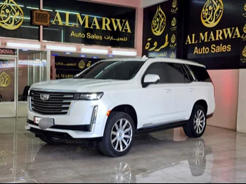  Cadillac  Escalade  Platinum  2021  Automatic  37,000 Km  8 Cylinder  Four Wheel Drive (4WD)  SUV  White  With Warranty