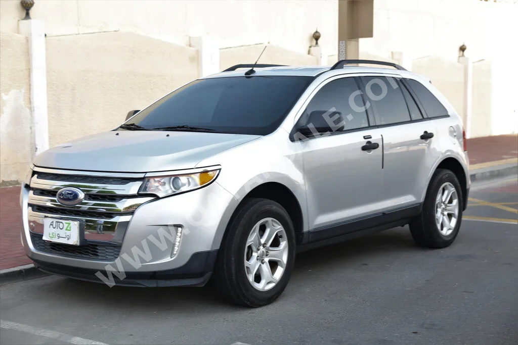 Ford  Edge  2013  Automatic  88,000 Km  6 Cylinder  All Wheel Drive (AWD)  SUV  Silver