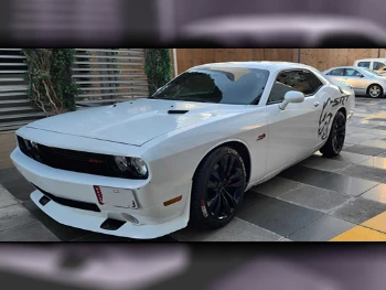 Dodge  Challenger  SRT-8  2014  Automatic  139,000 Km  8 Cylinder  Rear Wheel Drive (RWD)  Coupe / Sport  White