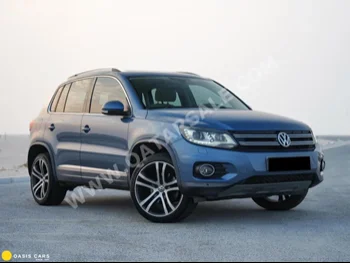 Volkswagen  Tiguan  2.0 TSI  2014  Automatic  53,000 Km  4 Cylinder  All Wheel Drive (AWD)  SUV  Blue  With Warranty