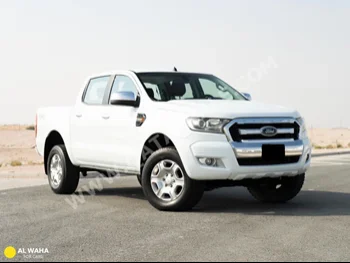 Ford  Ranger  XLT  2016  Manual  58,000 Km  4 Cylinder  Four Wheel Drive (4WD)  Pick Up  White