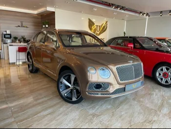 Bentley  Bentayga  First Edition  2017  Automatic  64,000 Km  12 Cylinder  Four Wheel Drive (4WD)  SUV  Bronze
