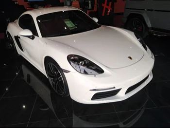 Porsche  Cayman  718  2018  Automatic  40,000 Km  4 Cylinder  Rear Wheel Drive (RWD)  Coupe / Sport  White