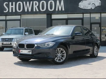 BMW  3-Series  316i  2014  Automatic  121,000 Km  4 Cylinder  Rear Wheel Drive (RWD)  Sedan  Dark Blue  With Warranty