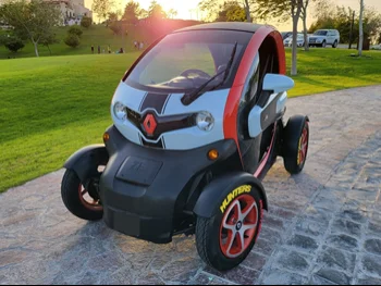 Renault  Twizy  2017  Automatic  22,000 Km  0 Cylinder  All Wheel Drive (AWD)  Hatchback  Red and Silver