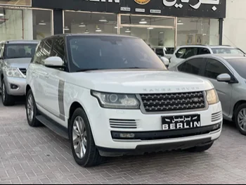 Land Rover  Range Rover  Vogue HSE  2015  Automatic  90,000 Km  8 Cylinder  Four Wheel Drive (4WD)  SUV  White
