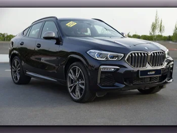 BMW  X-Series  X6 M50i  2020  Automatic  69,000 Km  8 Cylinder  Four Wheel Drive (4WD)  SUV  Black  With Warranty