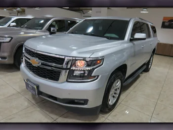 Chevrolet  Suburban  LS  2015  Automatic  122,000 Km  8 Cylinder  Four Wheel Drive (4WD)  SUV  Silver  With Warranty