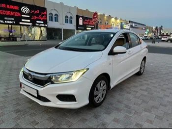 Honda  City  2019  Automatic  195,000 Km  4 Cylinder  Front Wheel Drive (FWD)  Sedan  White  With Warranty