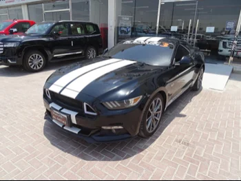 Ford  Mustang  2016  Automatic  91,000 Km  6 Cylinder  Rear Wheel Drive (RWD)  Coupe / Sport  Black  With Warranty