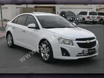 Chevrolet  Cruze  2013  Automatic  96,500 Km  4 Cylinder  Front Wheel Drive (FWD)  Sedan  White
