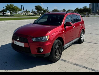 Mitsubishi  Outlander  2012  Automatic  375,000 Km  4 Cylinder  Four Wheel Drive (4WD)  SUV  Red