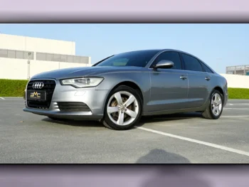 Audi  A6  2.0 T  2013  Automatic  124,000 Km  4 Cylinder  Front Wheel Drive (FWD)  Sedan  Gray