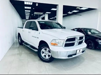 Dodge  Ram  1500  2012  Automatic  179,000 Km  8 Cylinder  Four Wheel Drive (4WD)  Pick Up  White  With Warranty