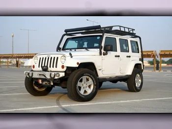 Jeep  Wrangler  Unlimited  2011  Automatic  180,000 Km  6 Cylinder  Four Wheel Drive (4WD)  SUV  White  With Warranty