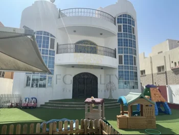 Family Residential  - Not Furnished  - Doha  - West Bay  - 4 Bedrooms