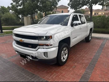 Chevrolet  Silverado  LT  2017  Automatic  96,288 Km  8 Cylinder  Four Wheel Drive (4WD)  Pick Up  White  With Warranty