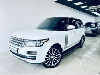 Land Rover  Range Rover  Vogue  2014  Automatic  219,000 Km  8 Cylinder  Four Wheel Drive (4WD)  SUV  White  With Warranty