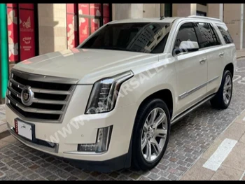 Cadillac  Escalade  2015  Automatic  259,000 Km  8 Cylinder  Four Wheel Drive (4WD)  SUV  White