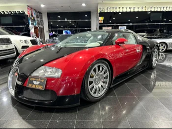 Bugatti  Veyron  2009  Automatic  15,000 Km  16 Cylinder  All Wheel Drive (AWD)  Coupe / Sport  Black and Red