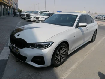 BMW  3-Series  330i  2019  Automatic  27,000 Km  4 Cylinder  Rear Wheel Drive (RWD)  Sedan  White  With Warranty