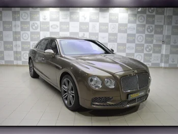 Bentley  Continental  Flying Spur  2014  Automatic  53,000 Km  12 Cylinder  All Wheel Drive (AWD)  Sedan  Brown  With Warranty
